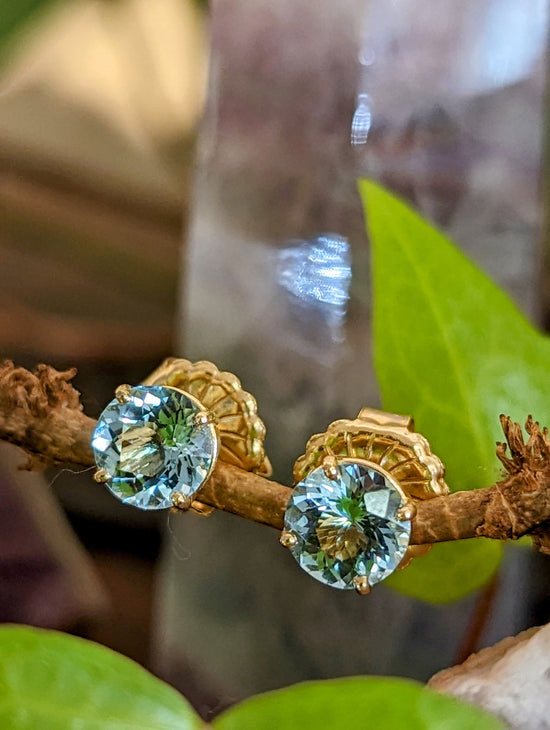 Photo of Aquamarine Studs in a decorative scene, designed by , available at Plumb Gold & Plumb Silver