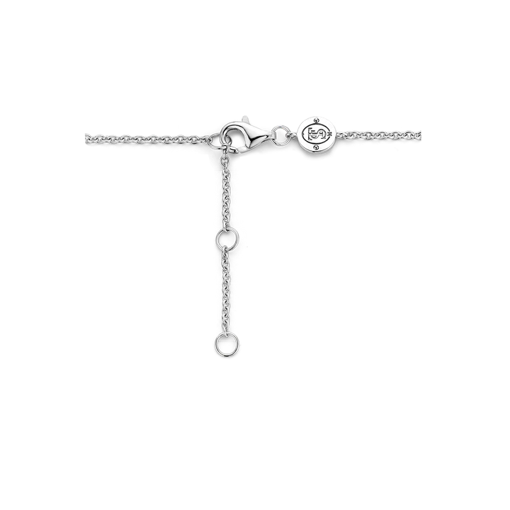 Photo of Blue Quartz and Cubic Zirconia Station Bracelet in a decorative scene, designed by , available at Plumb Gold & Plumb Silver