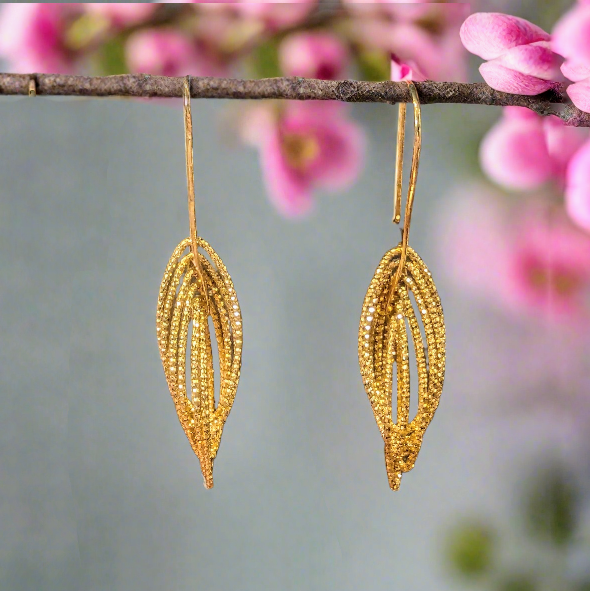 Photo of Cascading Glitter Dangles in a decorative scene, designed by , available at Plumb Gold & Plumb Silver