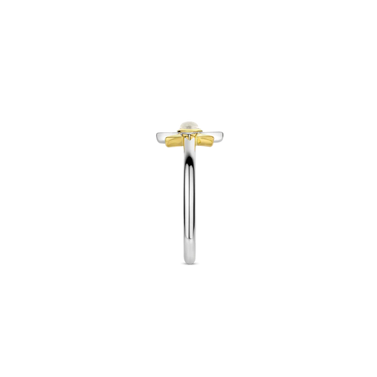 Photo of Celestial Star Ring in a decorative scene, designed by , available at Plumb Gold & Plumb Silver