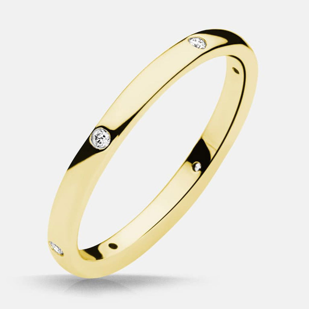 Photo of "Claire" Band in a decorative scene, designed by , available at Plumb Gold & Plumb Silver