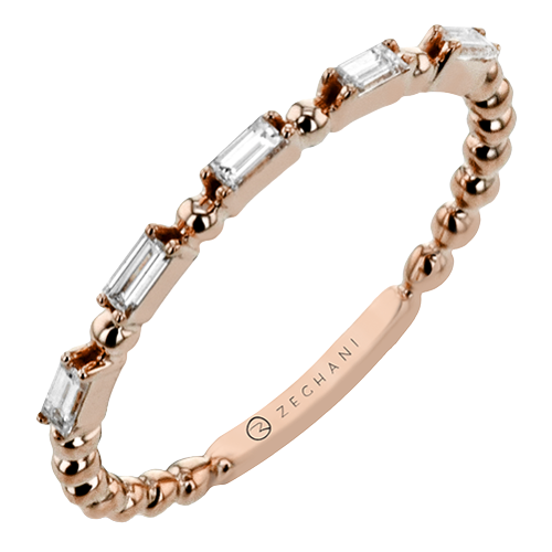 Photo of "Collette" Baguette Band in a decorative scene, designed by , available at Plumb Gold & Plumb Silver
