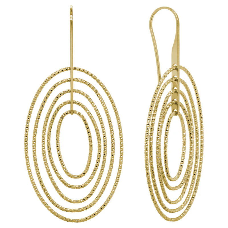 Photo of Concentric Oval Earrings in a decorative scene, designed by , available at Plumb Gold & Plumb Silver