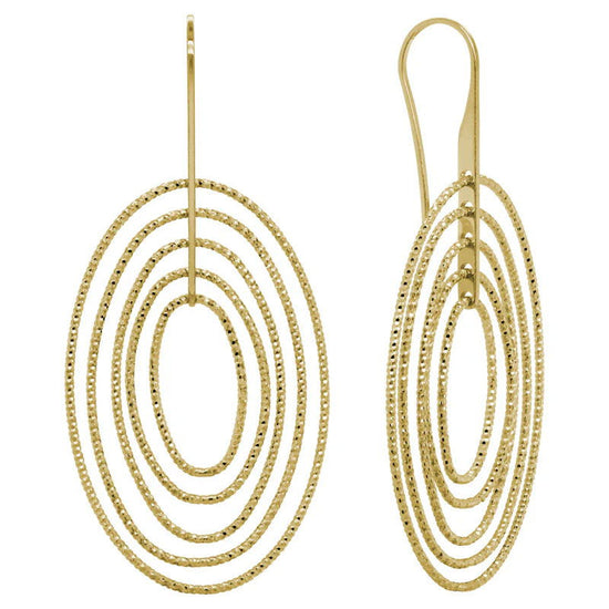 Photo of Concentric Oval Earrings in a decorative scene, designed by , available at Plumb Gold & Plumb Silver