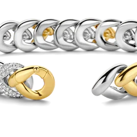 Photo of Cubic Zirconia Braided Link Necklace in a decorative scene, designed by , available at Plumb Gold & Plumb Silver