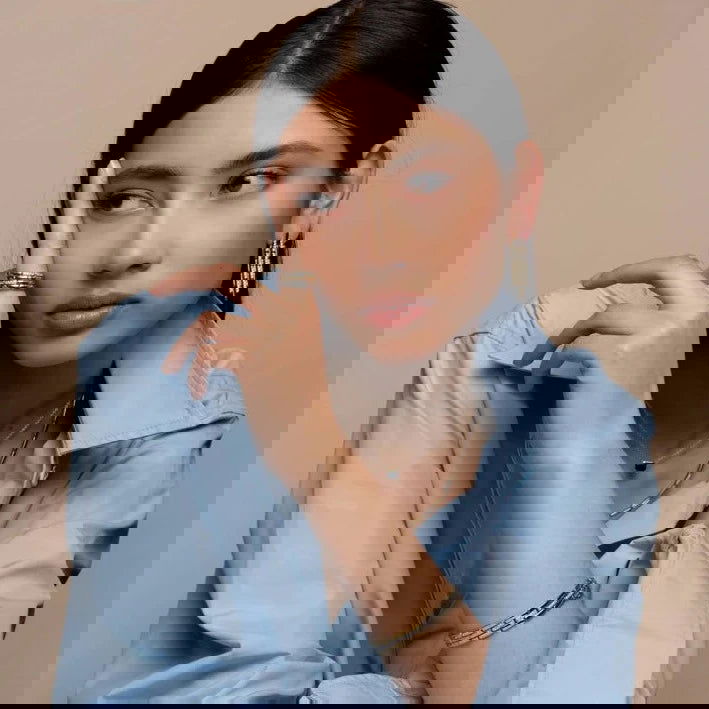 Photo of Cubic Zirconia Fancy Link Bracelet in a decorative scene, designed by , available at Plumb Gold & Plumb Silver