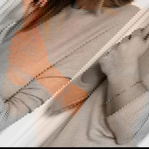 Photo of Cubic Zirconia Paperclip Link Bracelet in a decorative scene, designed by , available at Plumb Gold & Plumb Silver