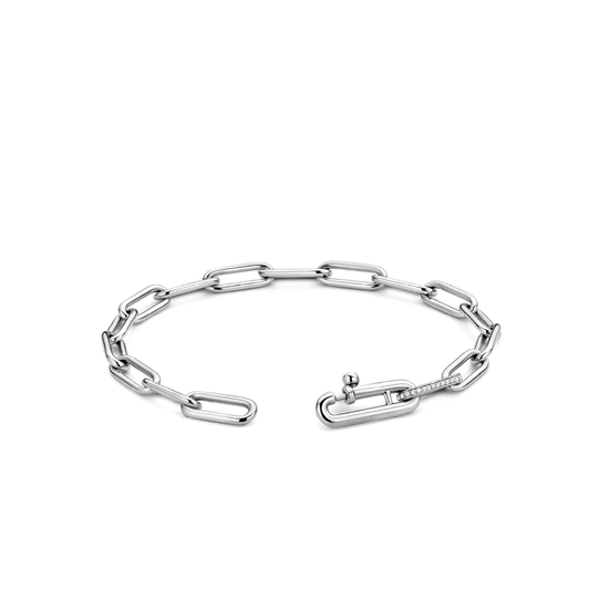 Photo of Cubic Zirconia Paperclip Link Bracelet in a decorative scene, designed by , available at Plumb Gold & Plumb Silver