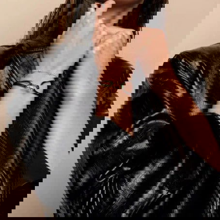 Photo of Cubic Zirconia Station Bracelet in a decorative scene, designed by , available at Plumb Gold & Plumb Silver