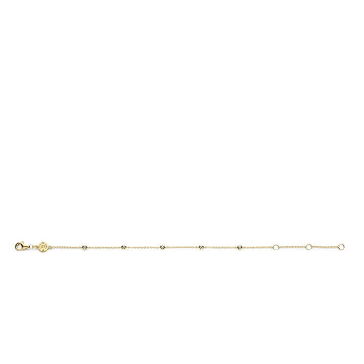 Photo of Cubic Zirconia Station Bracelet in a decorative scene, designed by , available at Plumb Gold & Plumb Silver