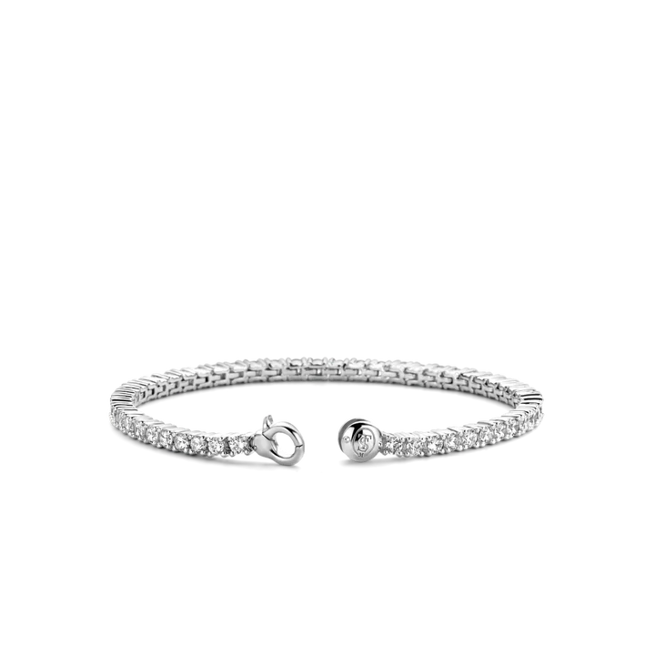 Photo of Cubic Zirconia Tennis Bracelet in a decorative scene, designed by , available at Plumb Gold & Plumb Silver