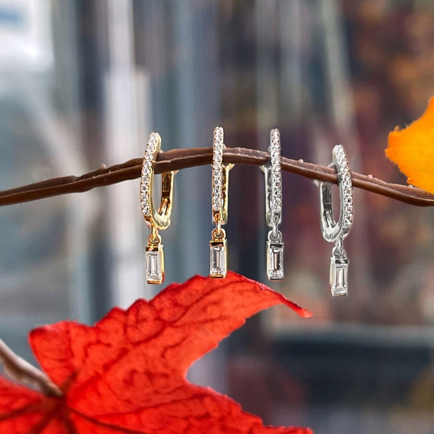 Photo of Diamond Earrings in a decorative scene, designed by -, available at Plumb Gold & Plumb Silver