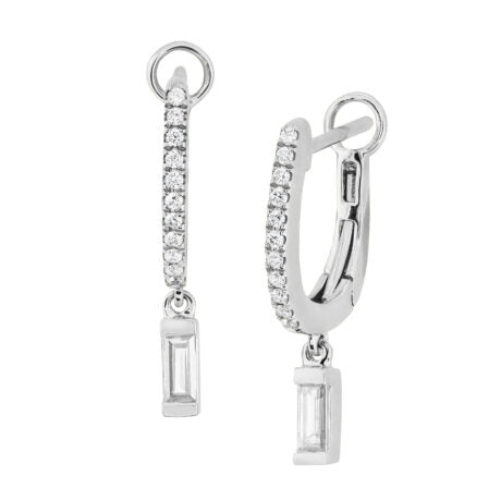 Photo of Diamond Earrings in a decorative scene, designed by -, available at Plumb Gold & Plumb Silver