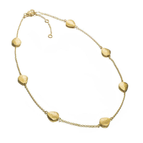 Photo of "Essential" Necklace in a decorative scene, designed by -, available at Plumb Gold & Plumb Silver