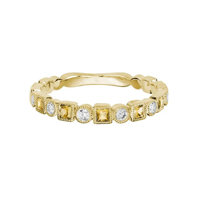 Photo of Gemstone Stackable Ring in a decorative scene, designed by , available at Plumb Gold & Plumb Silver