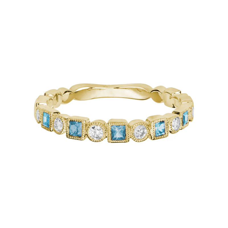 Photo of Gemstone Stackable Ring in a decorative scene, designed by , available at Plumb Gold & Plumb Silver