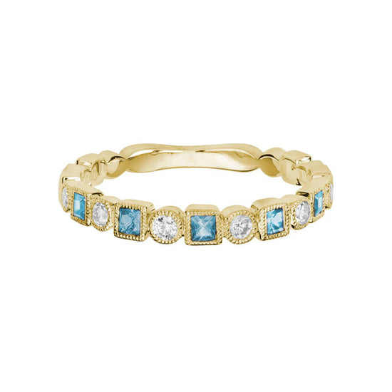 Photo of Gemstone Stackable Ring in a decorative scene, designed by , available at Plumb Gold & Plumb Silver
