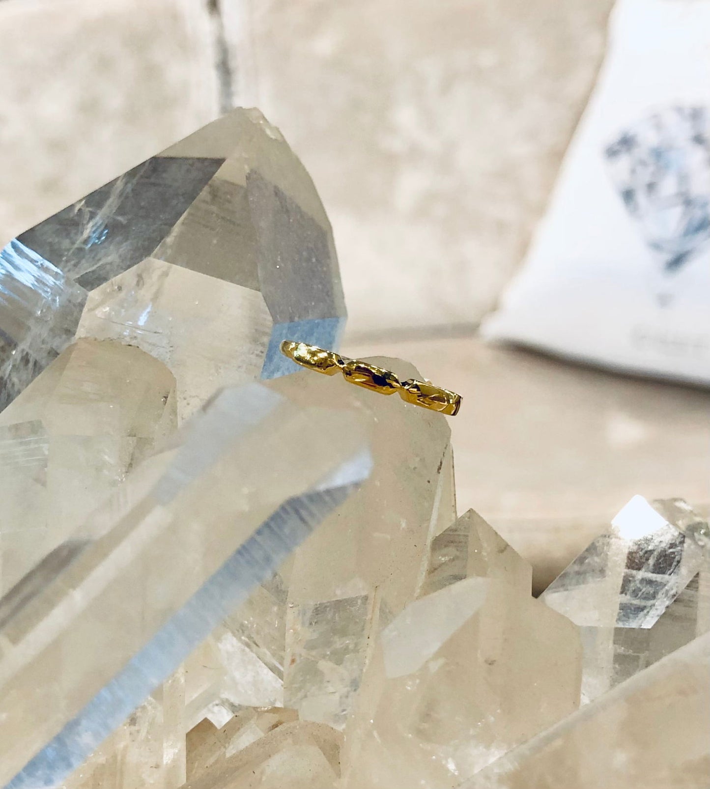 Photo of Geometric Segmented Band in a decorative scene, designed by , available at Plumb Gold & Plumb Silver
