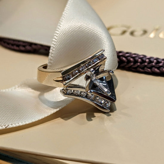 Photo of HL asymmetric Ring Mounting in a decorative scene, designed by , available at Plumb Gold & Plumb Silver