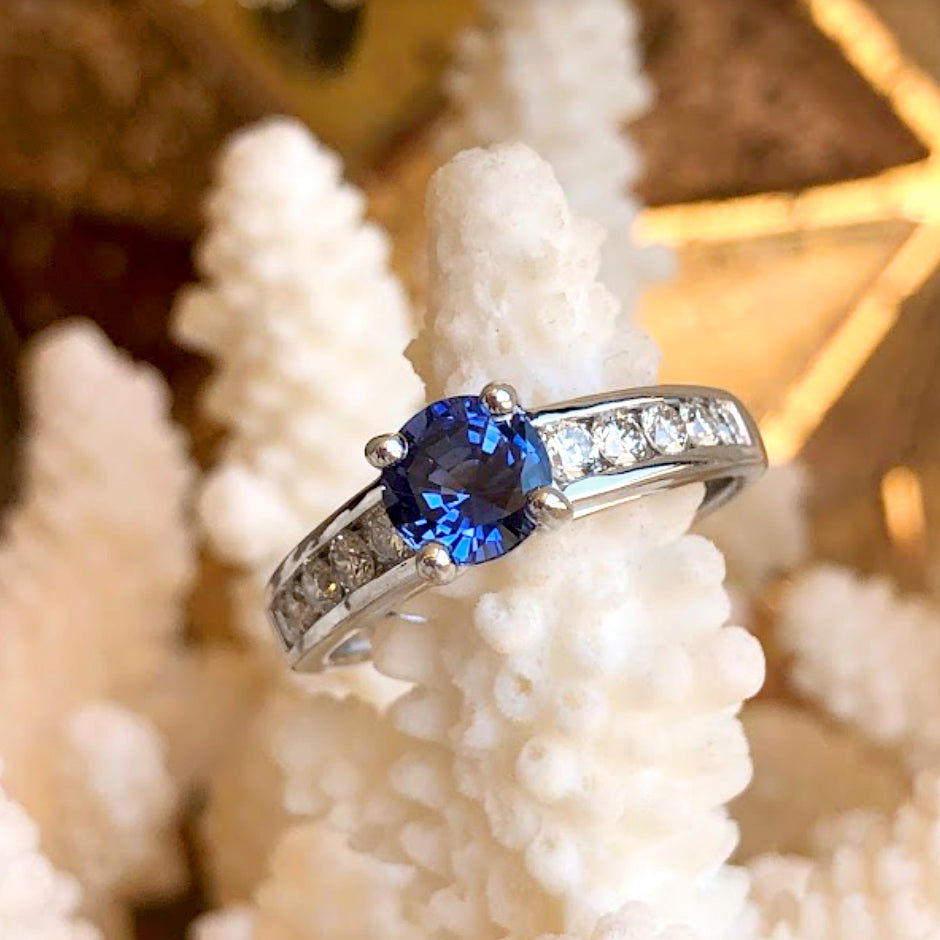 Photo of "Hannah" with Blue Sapphire in a decorative scene, designed by -, available at Plumb Gold & Plumb Silver