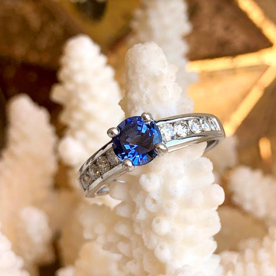 Photo of "Hannah" with Blue Sapphire in a decorative scene, designed by -, available at Plumb Gold & Plumb Silver