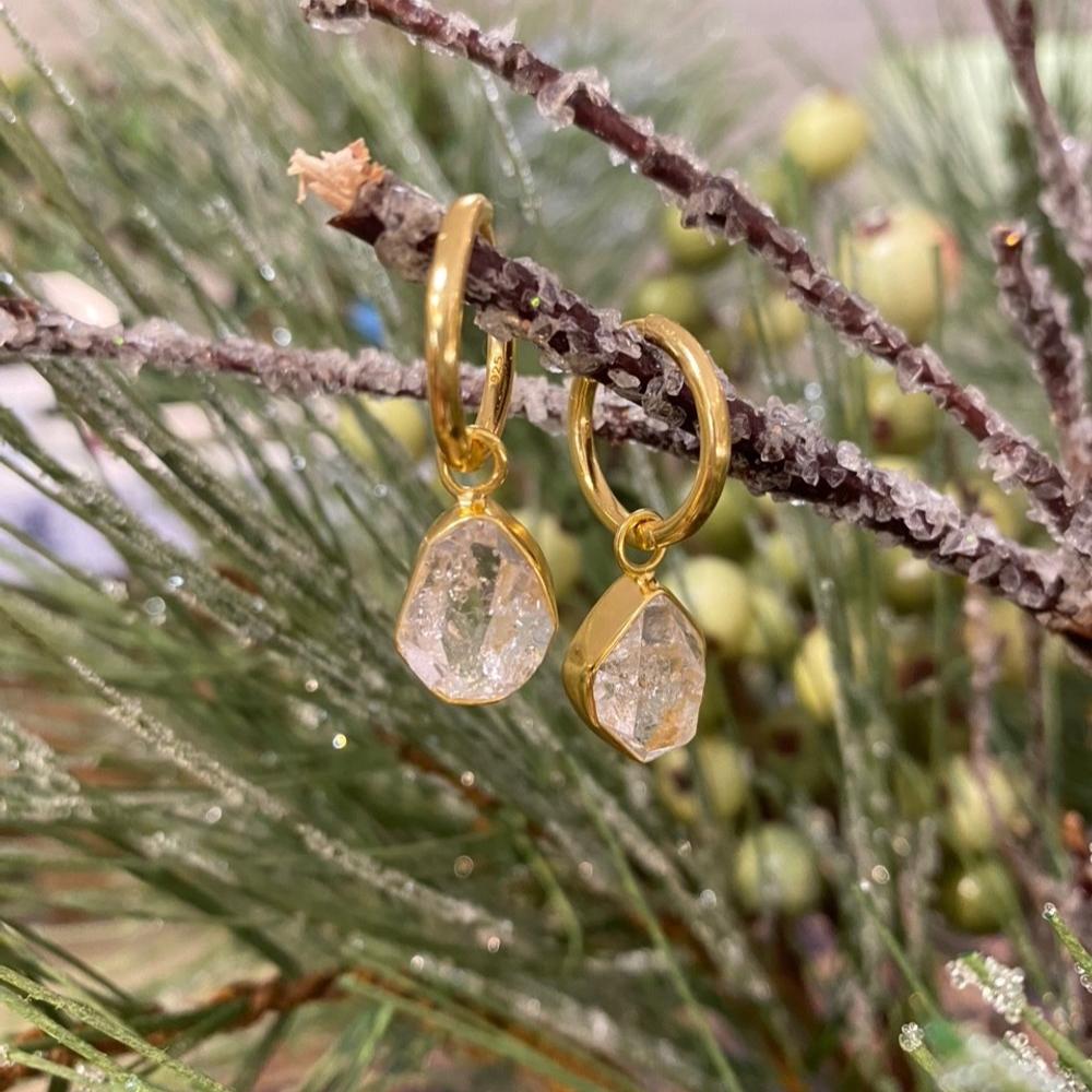 Photo of "Herkimer" Earrings in a decorative scene, designed by , available at Plumb Gold & Plumb Silver