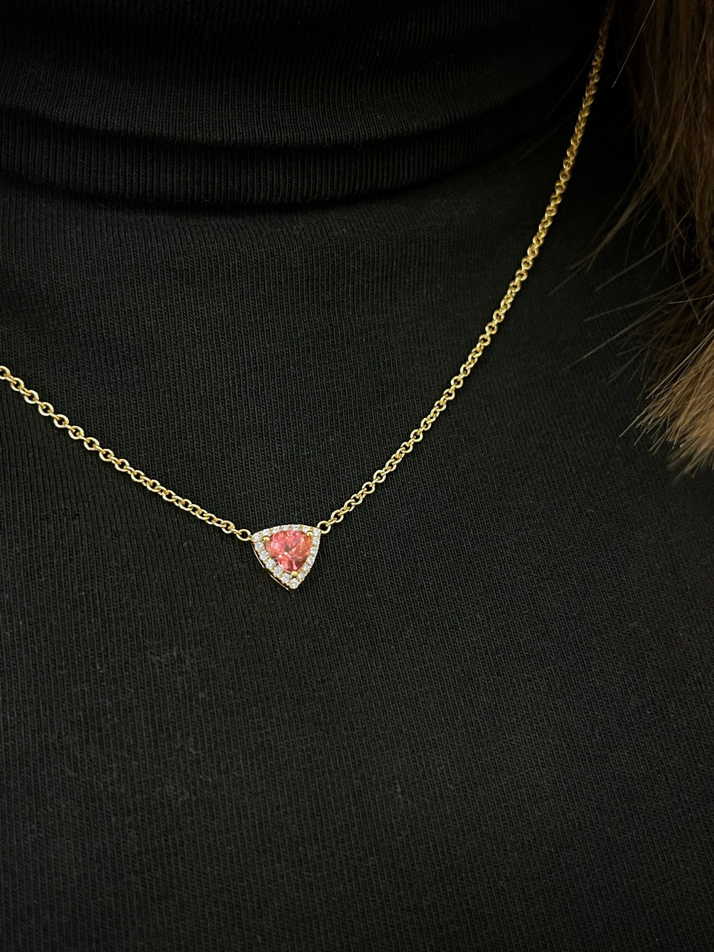 Photo of Kim Collins Pink Tourmaline Necklace in a decorative scene, designed by , available at Plumb Gold & Plumb Silver