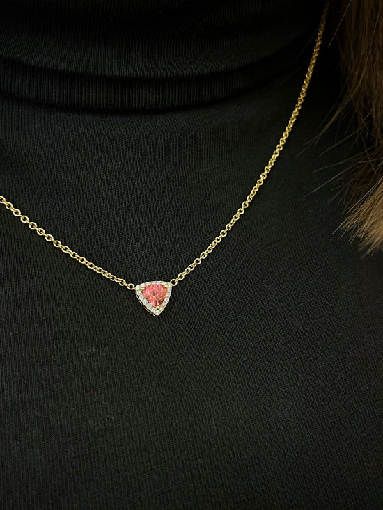 Photo of Kim Collins Pink Tourmaline Necklace in a decorative scene, designed by , available at Plumb Gold & Plumb Silver