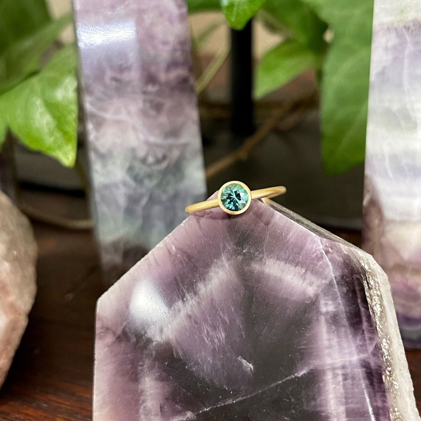 Photo of Kim Collins Seafoam Green Tourmaline Yumdrop in a decorative scene, designed by , available at Plumb Gold & Plumb Silver