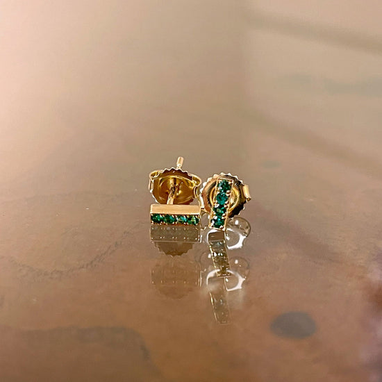 Photo of Kimberly Collins Stick Studs in a decorative scene, designed by , available at Plumb Gold & Plumb Silver