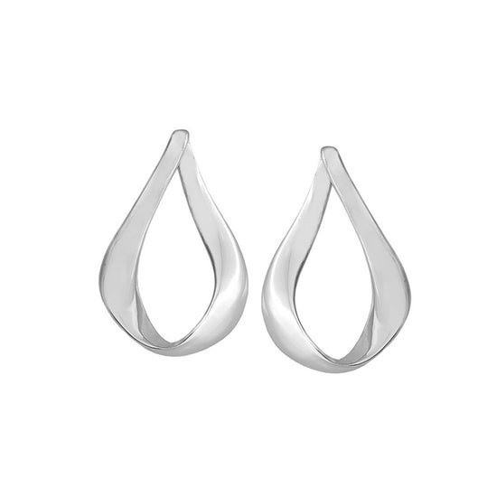 Photo of "Love" Earrings in a decorative scene, designed by -, available at Plumb Gold & Plumb Silver