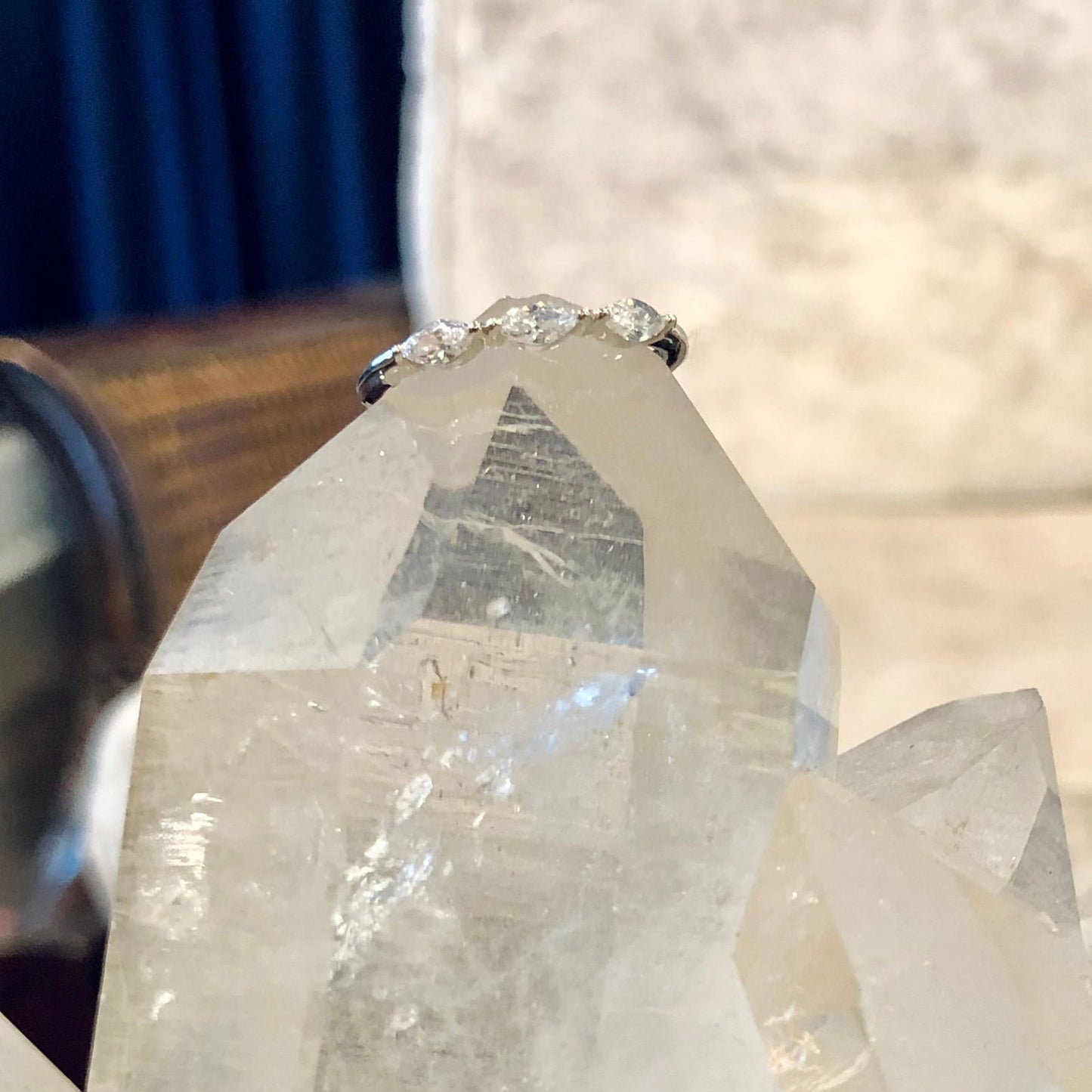 Ring resting on top of a quartz crystal