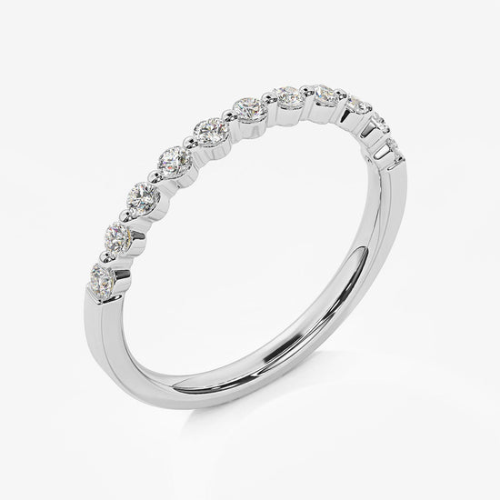 Photo of "Mira" band in a decorative scene, designed by , available at Plumb Gold & Plumb Silver