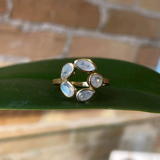 Photo of “Morning” Ring in a decorative scene, designed by , available at Plumb Gold & Plumb Silver