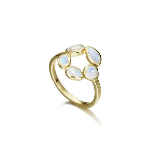 Photo of “Morning” Ring in a decorative scene, designed by , available at Plumb Gold & Plumb Silver