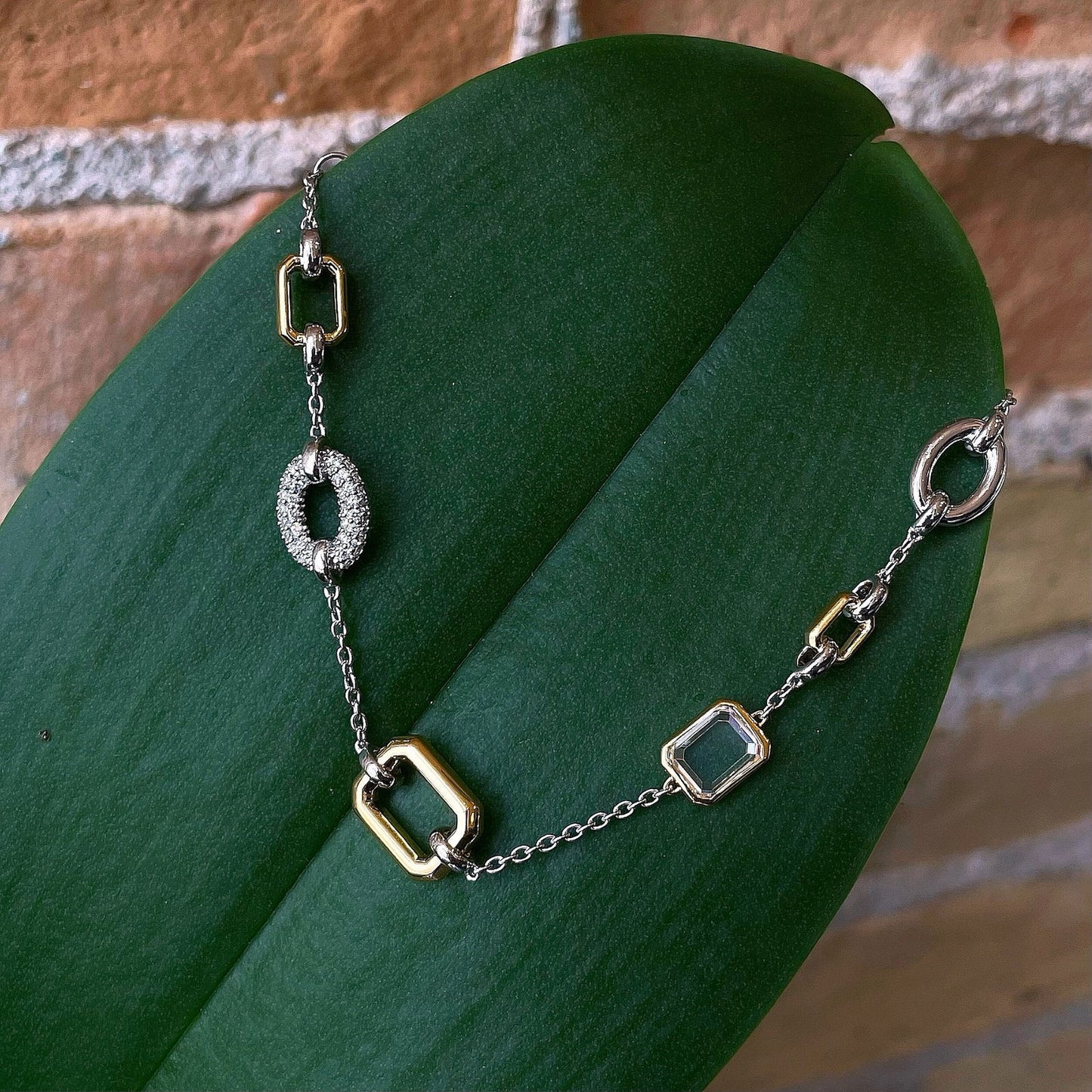 Photo of Multi-shape Bracelet in a decorative scene, designed by , available at Plumb Gold & Plumb Silver