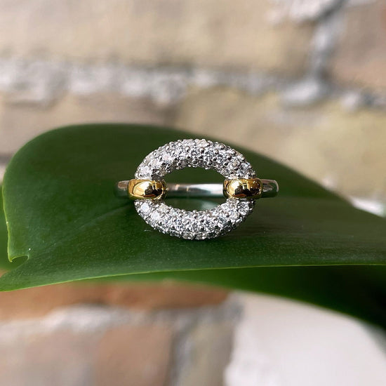 Photo of Oval Cubic Zirconia Ring in a decorative scene, designed by , available at Plumb Gold & Plumb Silver