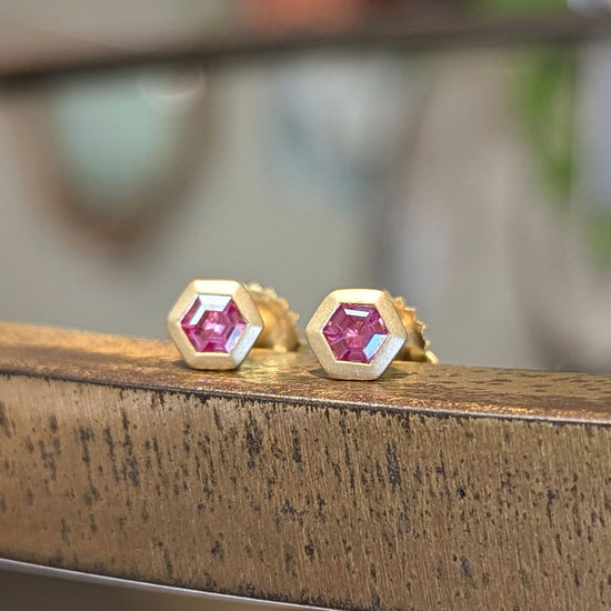 Photo of Pink Spinel Hex Studs in a decorative scene, designed by , available at Plumb Gold & Plumb Silver