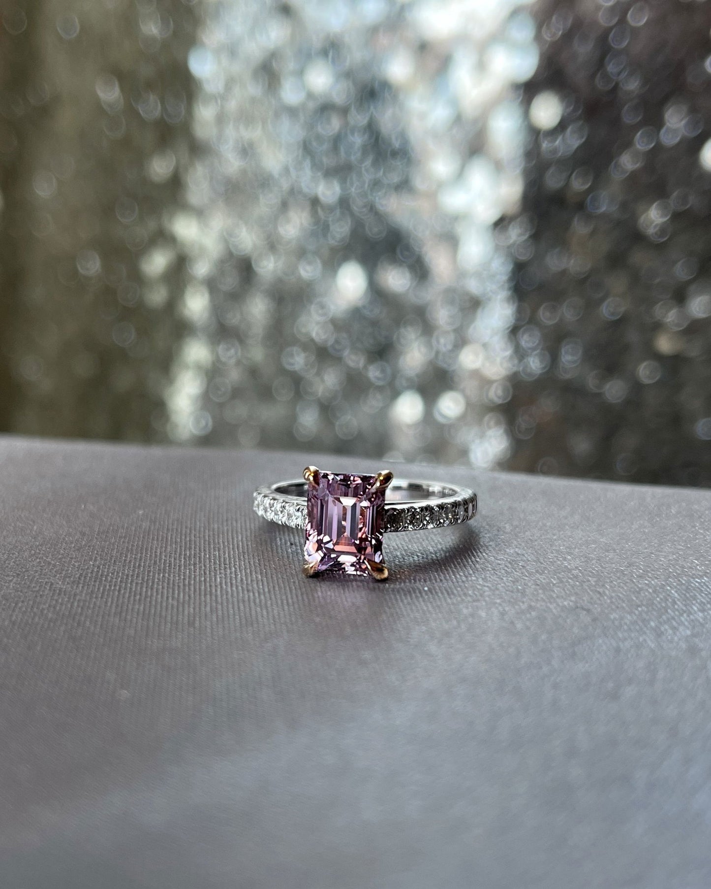 Photo of Pink Spinel Ring in a decorative scene, designed by , available at Plumb Gold & Plumb Silver