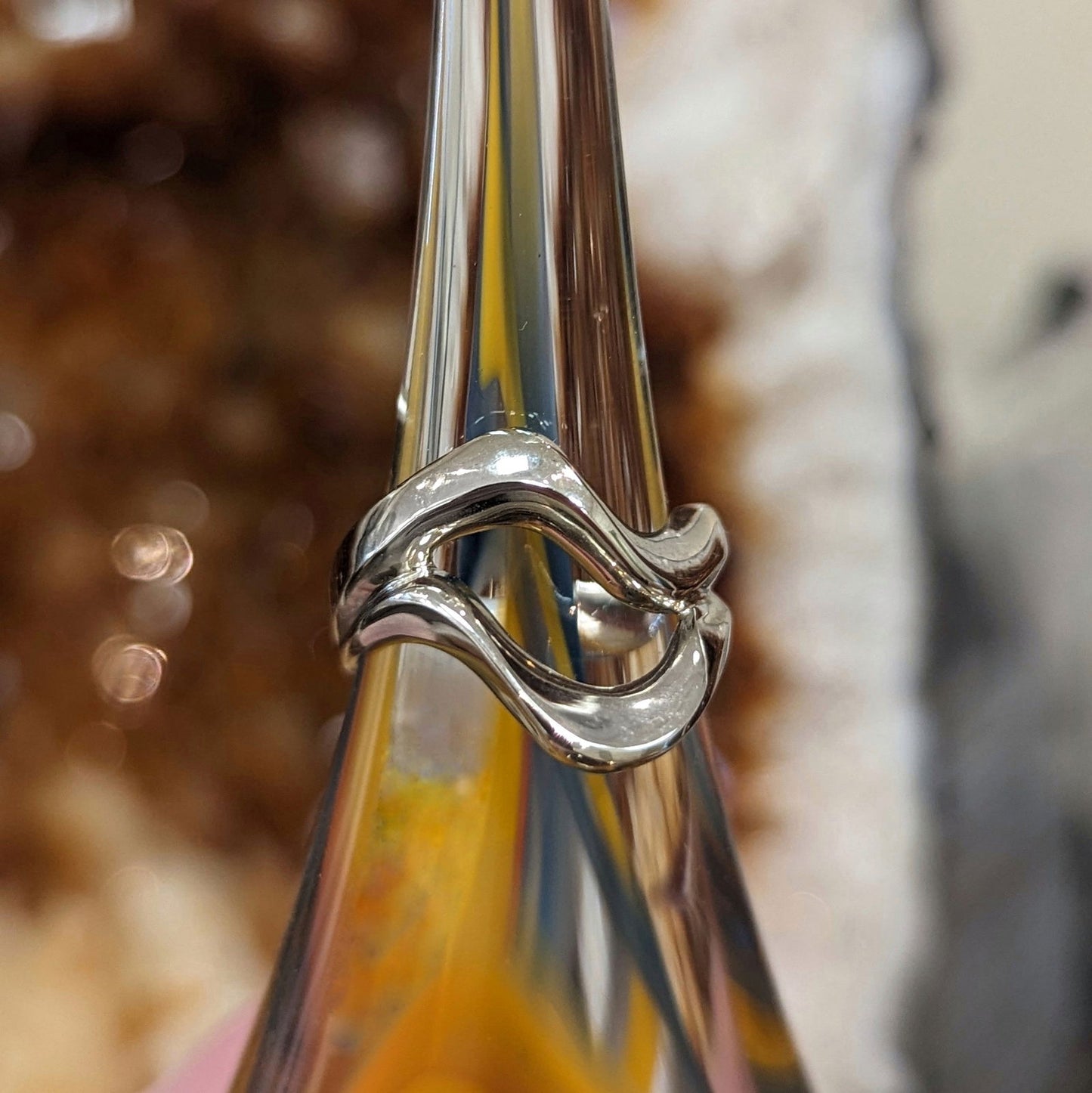 Photo of Plumb Gold Original Open Ring Mounting in a decorative scene, designed by , available at Plumb Gold & Plumb Silver