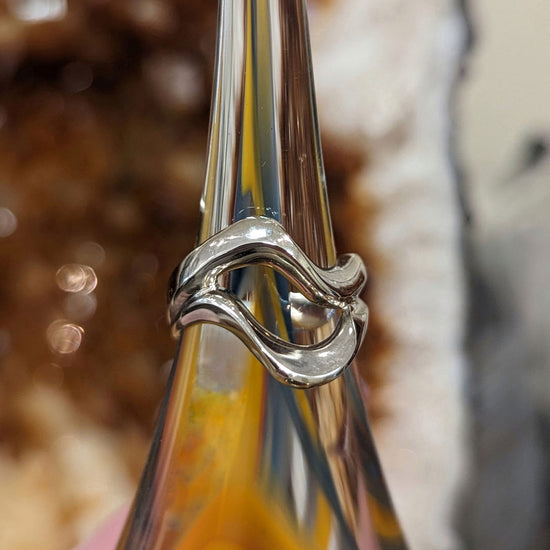 Photo of Plumb Gold Original Open Ring Mounting in a decorative scene, designed by , available at Plumb Gold & Plumb Silver