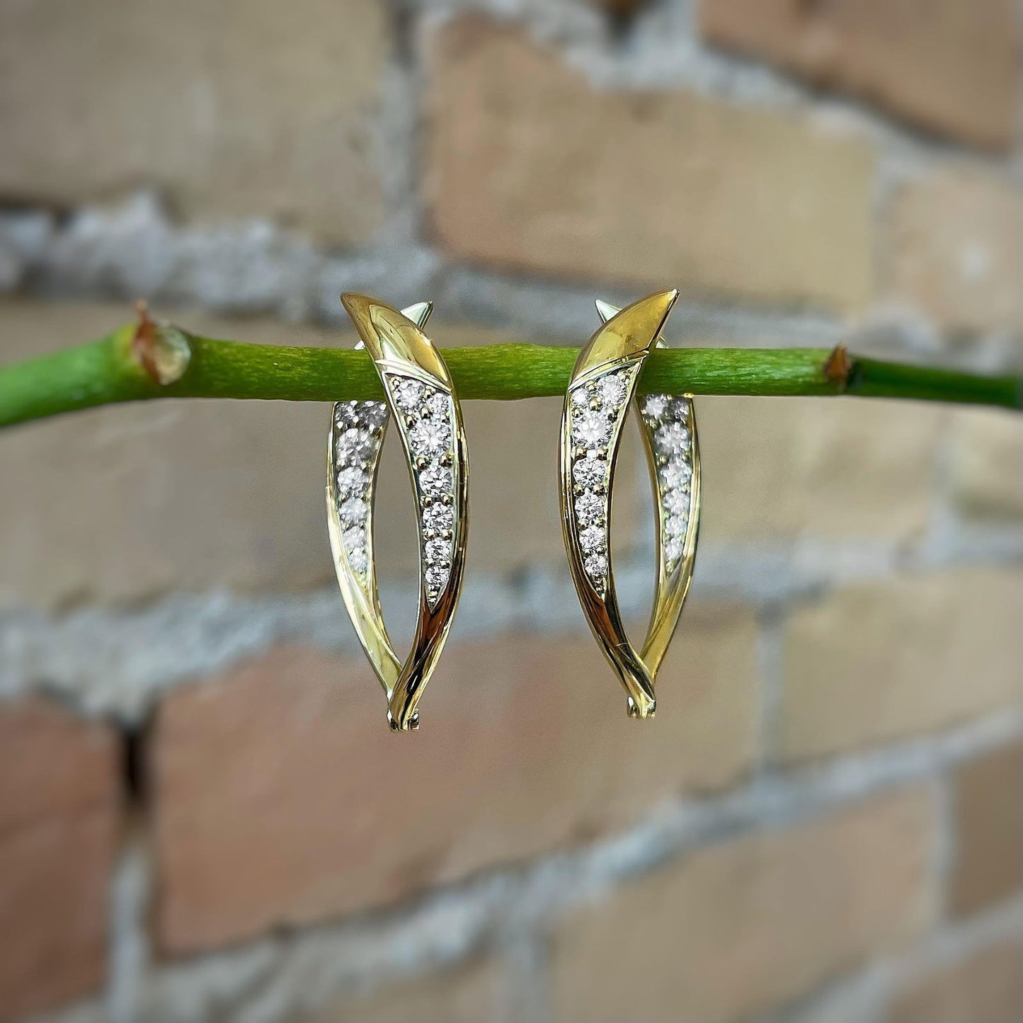 Photo of "Quinn" Hoops in a decorative scene, designed by , available at Plumb Gold & Plumb Silver