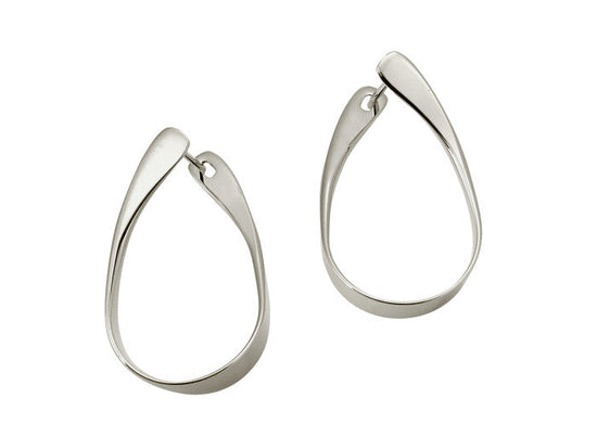 Photo of "Rhythmic Hoop" Earrings in a decorative scene, designed by , available at Plumb Gold & Plumb Silver