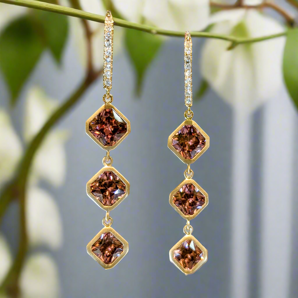 Photo of Rose Zircon Dangles in a decorative scene, designed by , available at Plumb Gold & Plumb Silver