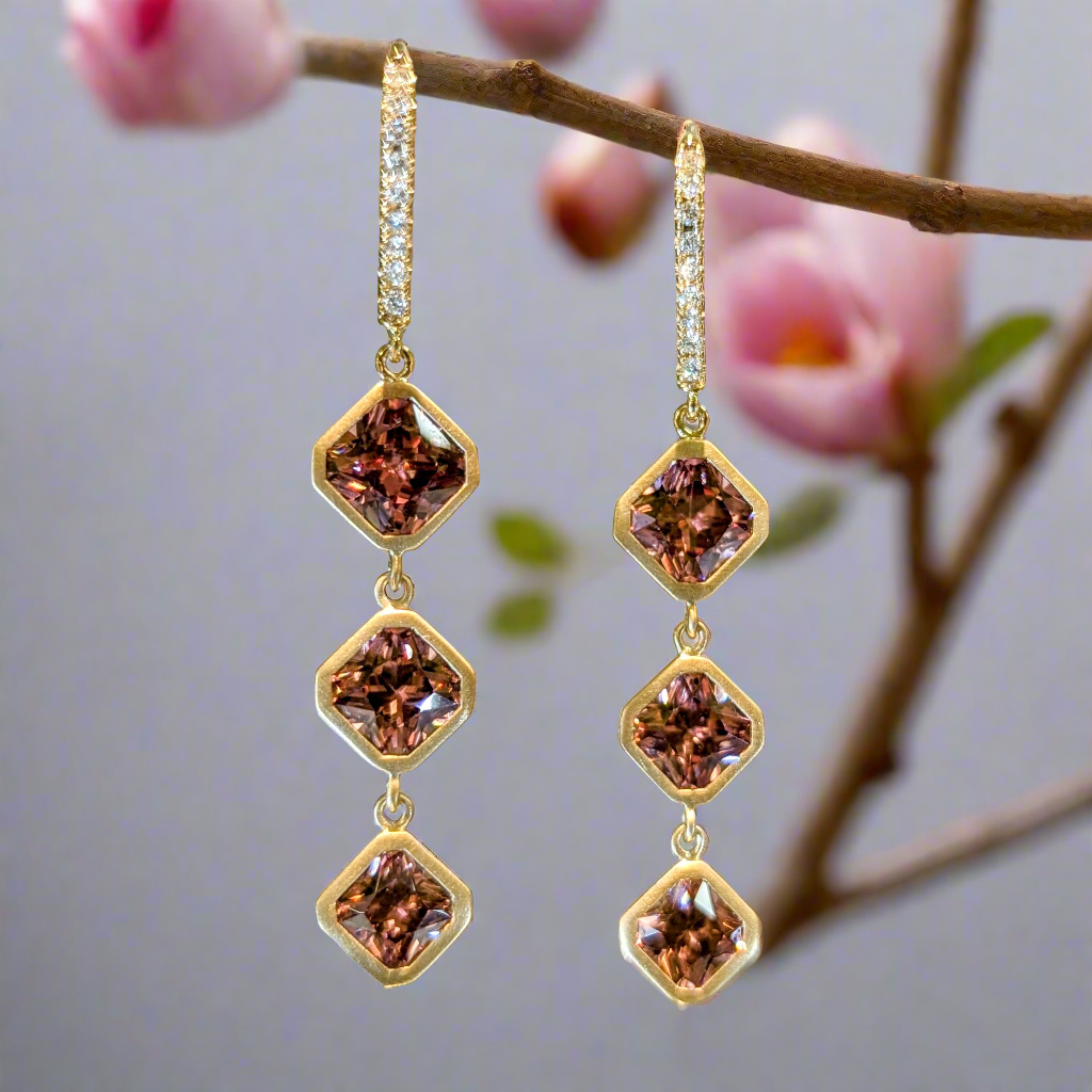 Photo of Rose Zircon Dangles in a decorative scene, designed by , available at Plumb Gold & Plumb Silver