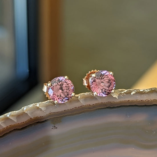 Photo of Rose Zircon Studs in a decorative scene, designed by , available at Plumb Gold & Plumb Silver