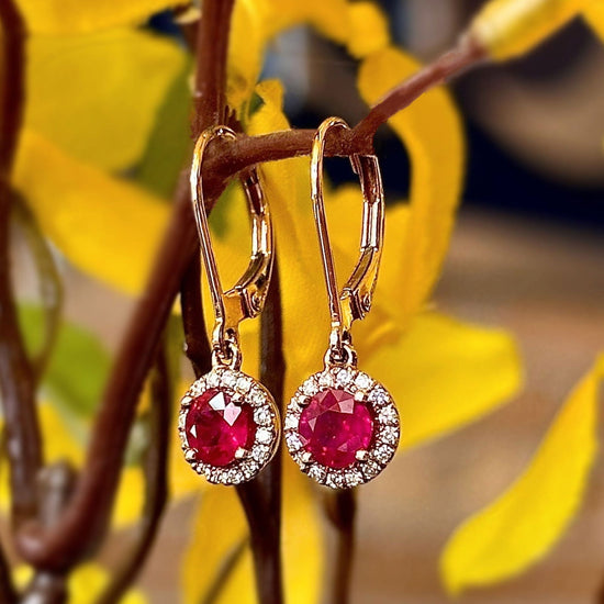 Photo of Rosy Ruby Halo Dangles in a decorative scene, designed by , available at Plumb Gold & Plumb Silver