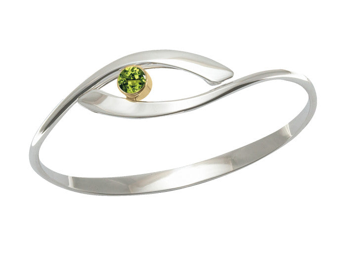 Photo of "Sensational Swing" Bracelet in a decorative scene, designed by , available at Plumb Gold & Plumb Silver