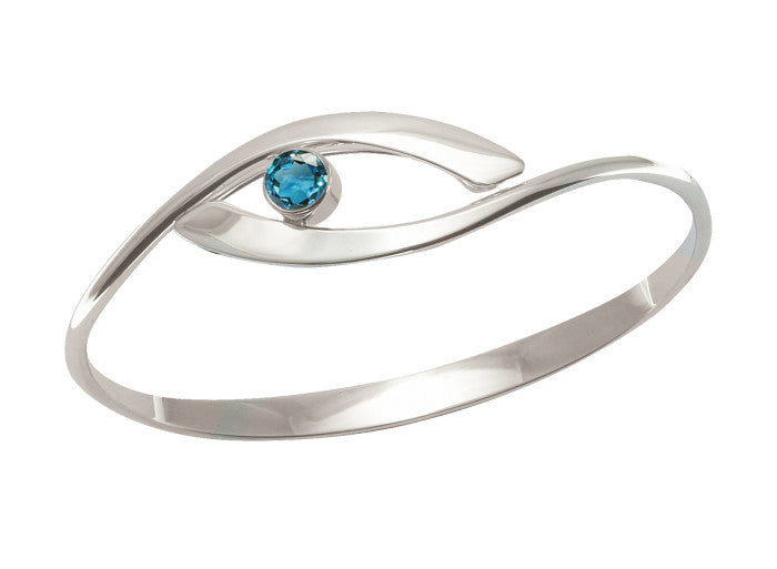 Photo of "Sensational Swing" Bracelet in a decorative scene, designed by , available at Plumb Gold & Plumb Silver