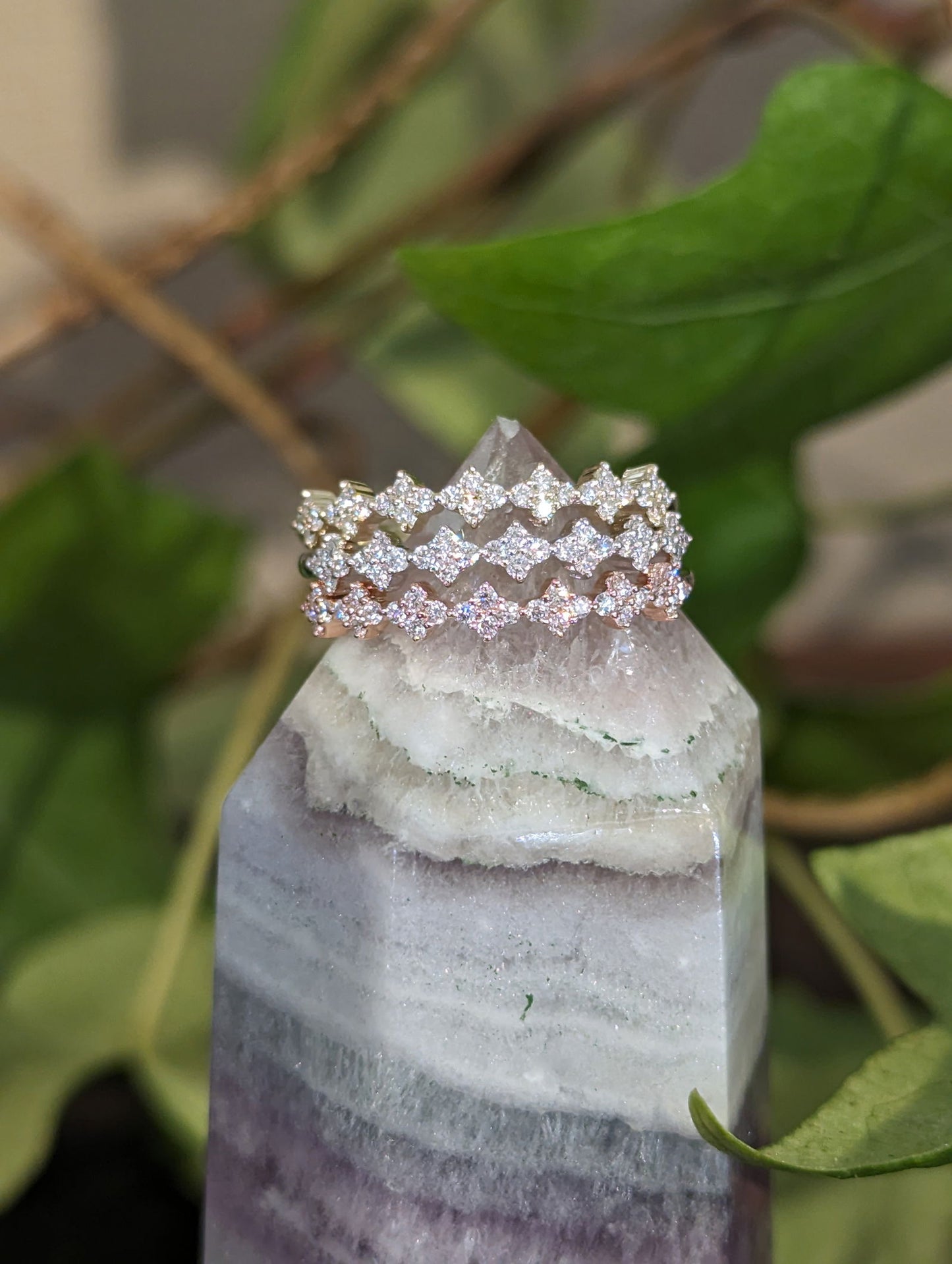 Photo of Stackable Rings in a decorative scene, designed by , available at Plumb Gold & Plumb Silver